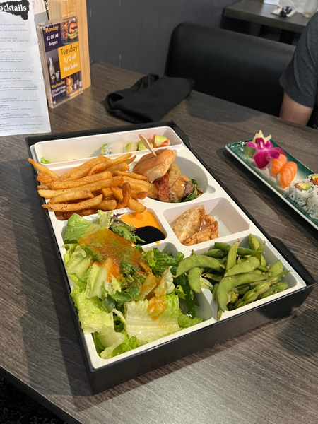 Burger, sushi, salad at The Madness
