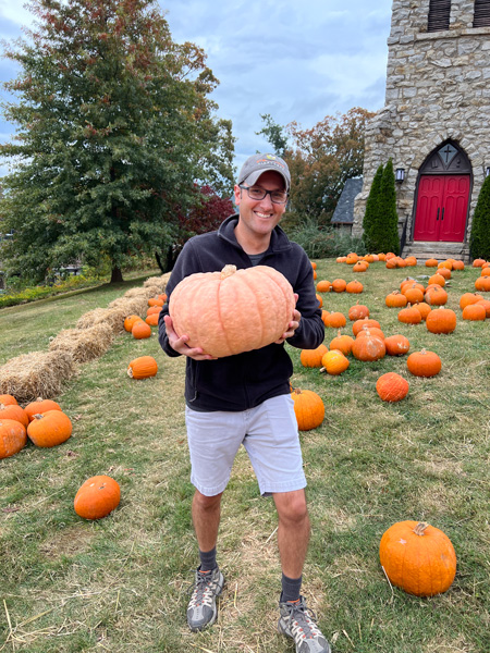 Tom with pumpkin at Grace Episcopal Church
