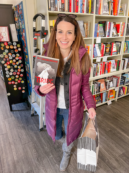 Christine with book at M Judson Booksellers